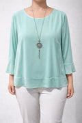 Blusa con voulant